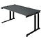 A grey desk with black legs. It is photographed at a slight angle from above.