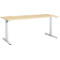 A rectangular, light wooden desk with light gray metal legs. The desk legs are T-shaped and the table top is light brown.