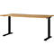 Hellbrauner Schreibtisch mit schwarzem Gestell, höhenverstellbar. Auf der rechten und linken Seite des Gestells sind Bedienelemente angebracht.