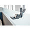 A gray scotch tape dispenser sticks to a white shelf. Transparent tape is being pulled.