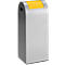 Silver trash can with a yellow lid. The lid is arched. There is a slot for waste at the top.