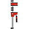 Serre-joint Bessey rouge avec base noire. La poignée est également rouge avec un insert noir.