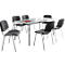 Table grise avec six chaises. Un cahier rouge et des stylos sont sur la table.