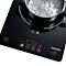 Induction hob with pot, water boiling, temperature display 120 degrees.