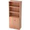 Beige wooden bookcase with open shelves and cabinet doors.