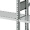Grey metal shelves, detailed view with holes and struts.