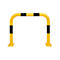 Yellow safety barrier with black stripes. Upright, square at the feet, curved at the top.