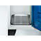 Metal tray with grooves inside a white cabinet, the door is blue.