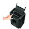A hand presses the power button of a black paper shredder. A sheet of paper sticks out.
