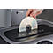 A hand places a CD into a shredder.