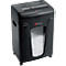 Black paper shredder with 'Rexel' logo. Visible paper waste in the transparent window, the device is on wheels.