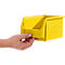 Eine Hand hält eine gelbe Sichtlagerbox von SSI Schäfer vor weissem Hintergrund.