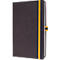Dark brown notebook with yellow elastic band. The book is closed, with a yellow bookmark and a yellow rubber band.