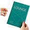 Hands holding a green flyer with the word "LOUNGE" in a transparent protective sleeve.