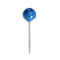 A blue thumbtack with a spherical head on a white background.