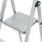 Close-up of a silver step ladder. The ribbed platform is in focus, along with the sturdy metal rungs.