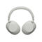 Hellgrauer Over-Ear-Kopfhörer von Sony. Das gepolsterte Kopfband verbindet die ovalen Ohrmuscheln, auf denen "Sony" steht.