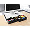 Desk with monitor, drawers for office supplies. The drawers contain pens, sticky notes, a cell phone and other items.