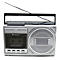 Boombox argenté avec lecteur de cassettes et antenne.