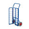 Blue hand truck against white background. Grid, two wheels, red hub ring. Handle.