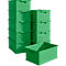 Green plastic boxes stacked. One box stands in front.
