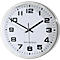 Round, silver wall clock with white face. Black numerals and hands, text 'Radio Controlled'.