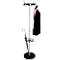 Coat stand with jacket, scarf, and umbrella. Black base, silver pole, coat hooks with knobs.