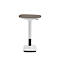 Standing stool against white background. Beige seat on white frame, black foot.
