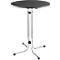 Round, black bar table with chrome-plated frame. Four-legged base, plastic table top.