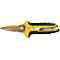Scissors with yellow and black handles and gold-colored blades. The word 'STANLEY' is visible.
