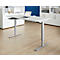 Light gray height-adjustable desk with laptop and drawer. Office furniture in the background.
