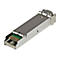 Ein silberner SFP-Transceiver, einsteckbar mit grünem PCB.