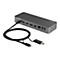 Grauer USB-C-Hub mit Kabeln. Beschriftungen: Video 1, Video 2, HDMI, Ethernet, USB-Ports. Marke: StarTech.com.