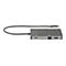Grauer USB-C-Hub mit Kabel. Auf der Oberseite befinden sich AnschlÃ¼sse mit Beschriftung.