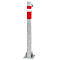 Post to protect against cars. Gray, with red and white stripes, lock with key.
