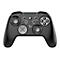 Schwarzer Gamecontroller mit Knöpfen und Joysticks. Oben Ziffern 1-4, darunter Knöpfe mit Beschriftungen wie Turbo, Select, Menu, Start.
