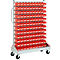 Rolling cart with red storage bins. A silver frame with many rows of red bins. Wheels at the bottom.