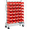 Red cart with drawers. Many red drawers are mounted in a metal frame, including rollers for mobility.