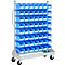 Blue shelf with numerous drawers. On wheels, with handle.