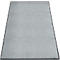Tapis gris clair avec une bordure noire. Pris d'une perspective haute.