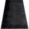 Tapis de porte rectangulaire noir avec une bordure foncée, sur fond blanc.