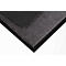Gros plan d'un tapis gris avec un bord en caoutchouc noir et une couche noire lisse.