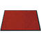 Paillasson rouge avec bordure noire. Le tapis a une surface rugueuse.