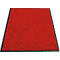 Paillasson rouge avec un cadre noir. La surface est recouverte de petites fibres.
