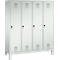 Un armario blanco con cuatro puertas. Cada puerta tiene una cerradura y ranuras de ventilación.