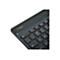 Gros plan sur un clavier noir. Le cadre a un motif moucheté. Les touches "esc", "tab", "1", "2", "3", "Q", "W", "A", "lock" sont visibles sur le clavier.