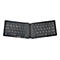 Schwarze, faltbare Tastatur. Die Tastatur ist geÃ¶ffnet und zeigt die Tasten, mit Beschriftungen wie Buchstaben, Zahlen und Symbolen.