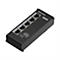 Schwarzer Teltonika TSF010 Netzwerk-Switch mit fünf RJ45-Ports und Stromeingang.