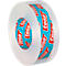 Close-up of a clear tesafilm roll, label with red text on a blue background.