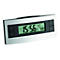 Digitaler Funkwecker in Silber mit schwarzem Display und Tasten für Modus, Alarm und Einstellung.